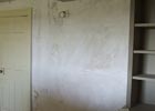 Wall repair after application of lime putty to give a smooth finish for painting