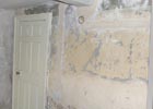 Lime plaster repair to a wall
